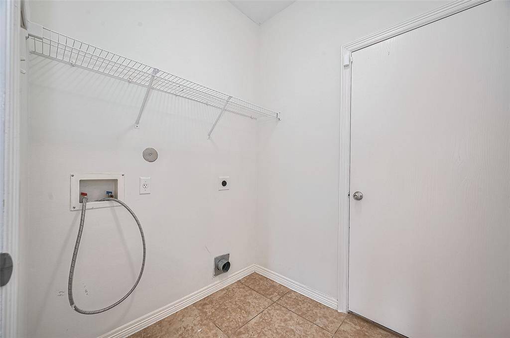 Walk in closet thoughtfully designed to keep your wardrobe perfectly arranged.
