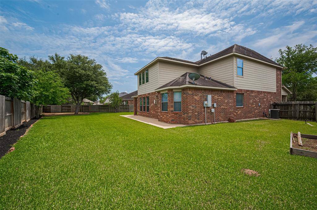 Imagine hosting family BBQs or quiet dinners under the stars on the spacious patio.