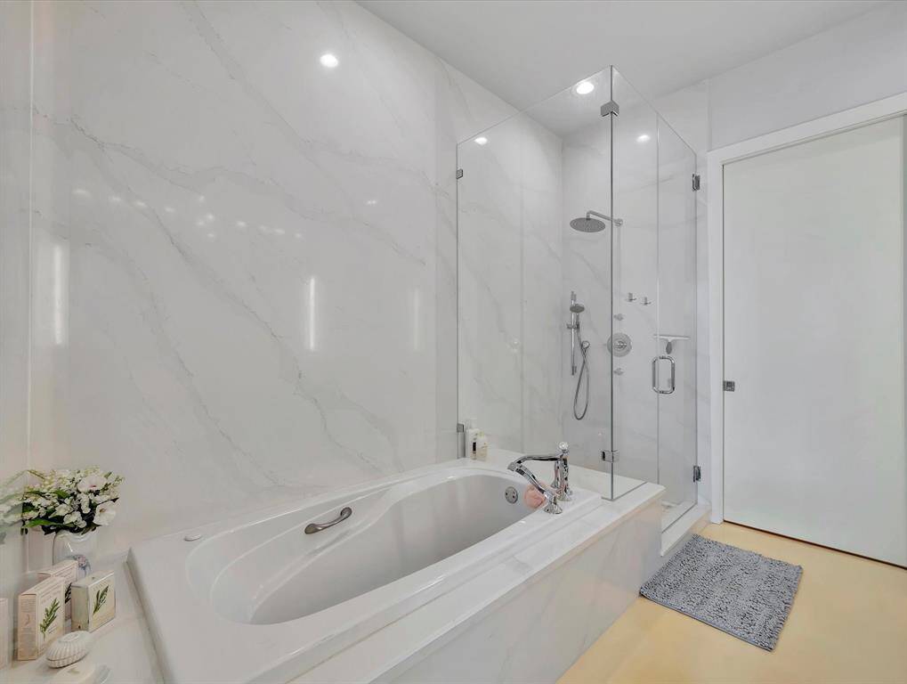 PRIMARY BATH, JETTED TUB, GLASS SHOWER, UPGRADED HARDWARE, QUARTZ WALL