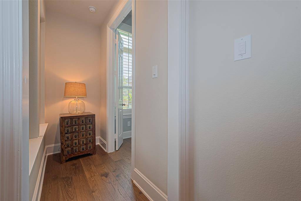 The primary bedroom is tucked away from the rest of the home with it's own secluded hallway