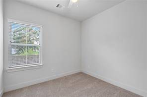One of the 1st floor secondary bedrooms