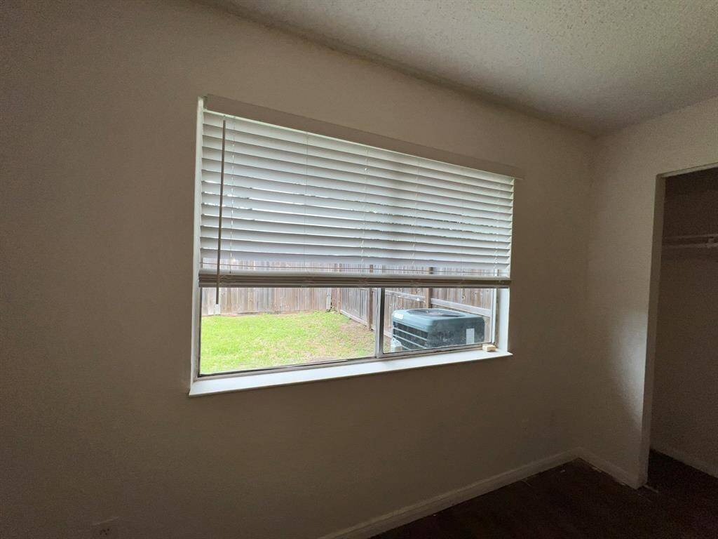 Window in the secondary bedroom.
