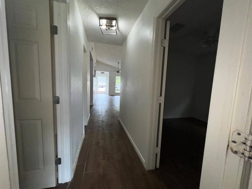 Hallway area coming out of the bedroom areas.