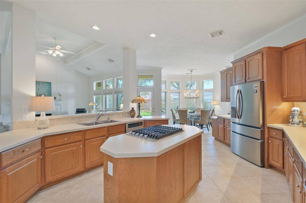 YOU HAVE A LARGE KITCHENOPEN TO YOUR FAMILYROOM.