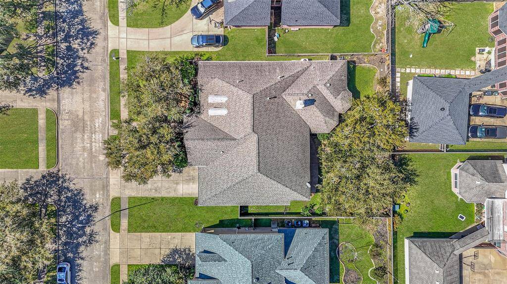 CLASSIC CURB APPEAL WITHMATURE TREES & LUSHLANDSCAPING.