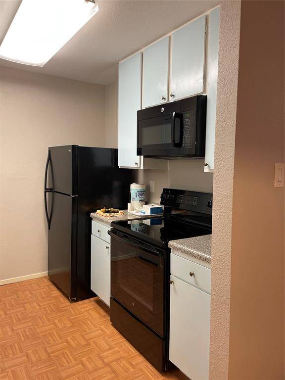 Clean and well-maintained kitchen with updated appliances.