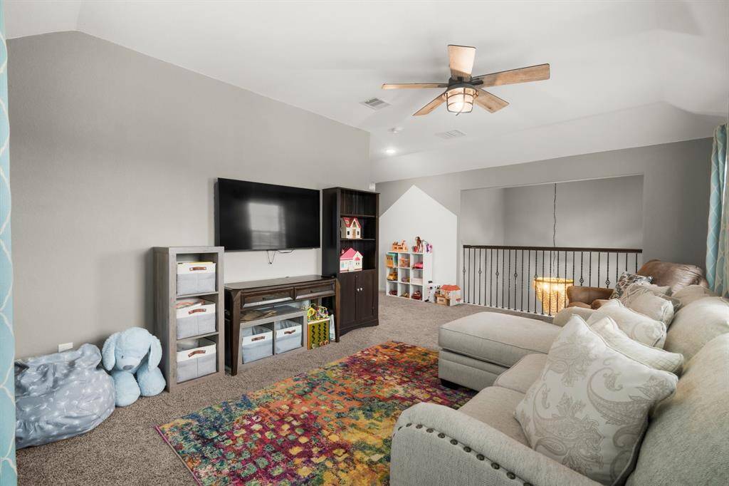 Enjoy the ultimate entertainment experience in this spacious game room—perfect for movie nights, watching the big game, or playing your favorite video games in comfort and style. For an immersive experience, click the movie reel icon to view our walk-through video!