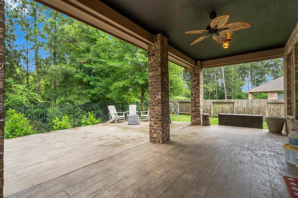 Step into your own backyard retreat with this expansive 23’ x 22’ covered patio—perfectly designed for both relaxation and entertaining. Whether you're firing up the grill, unwinding with a cold drink, or keeping an eye on the kids splashing in the pool, this generous outdoor space offers it all. Surrounded by the sights and sounds of nature, it’s the perfect private setting to enjoy peaceful mornings or unforgettable evenings.
