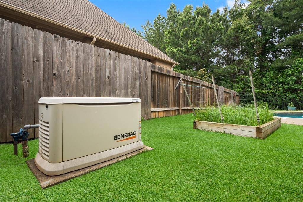 Stay powered and protected year-round with a whole-house backup generator—offering peace of mind, uninterrupted comfort, and reliable convenience during unexpected outages. The raised garden bed offers an organic option to herbs or vegetables.
