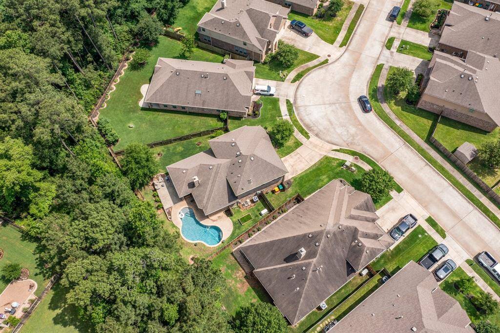 A wooded greenbelt ensures privacy between your back neighbors.