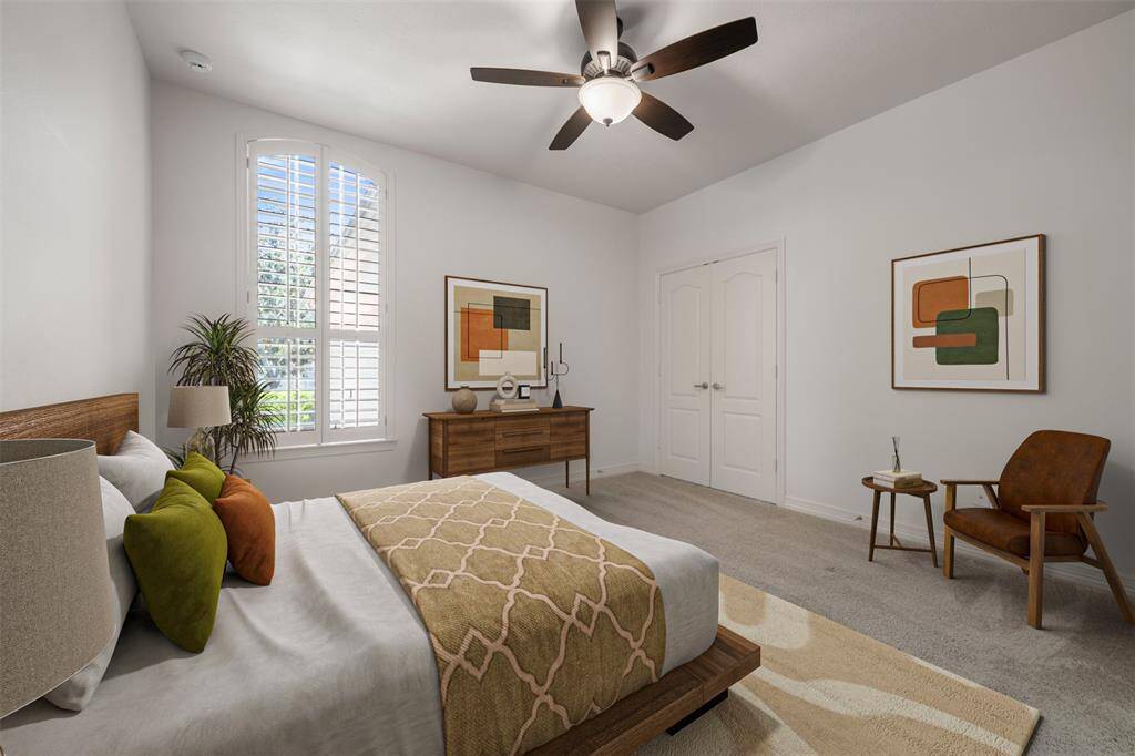 The third bedroom exudes elegance, featuring beautiful shutter-style windows that bathe the space in natural light. The expansive closet offers generous storage, while the luxurious en suite bath adds a touch of privacy and sophistication, making this room a serene and refined retreat.(This photo is virtually staged)
