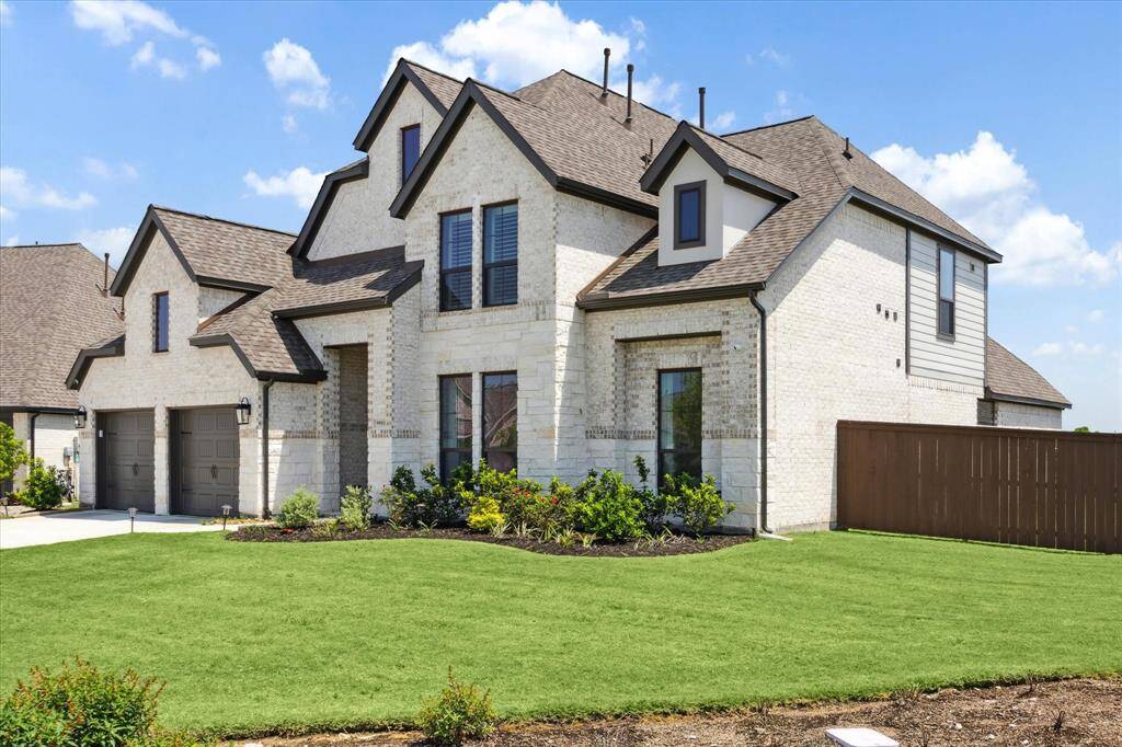 Extended front yard area provides additional room ample space between neighbors.