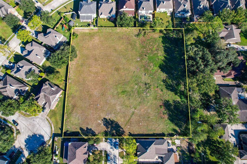 Attention builders! This 2+ acre lot can accommodate 8-10 single-family homes