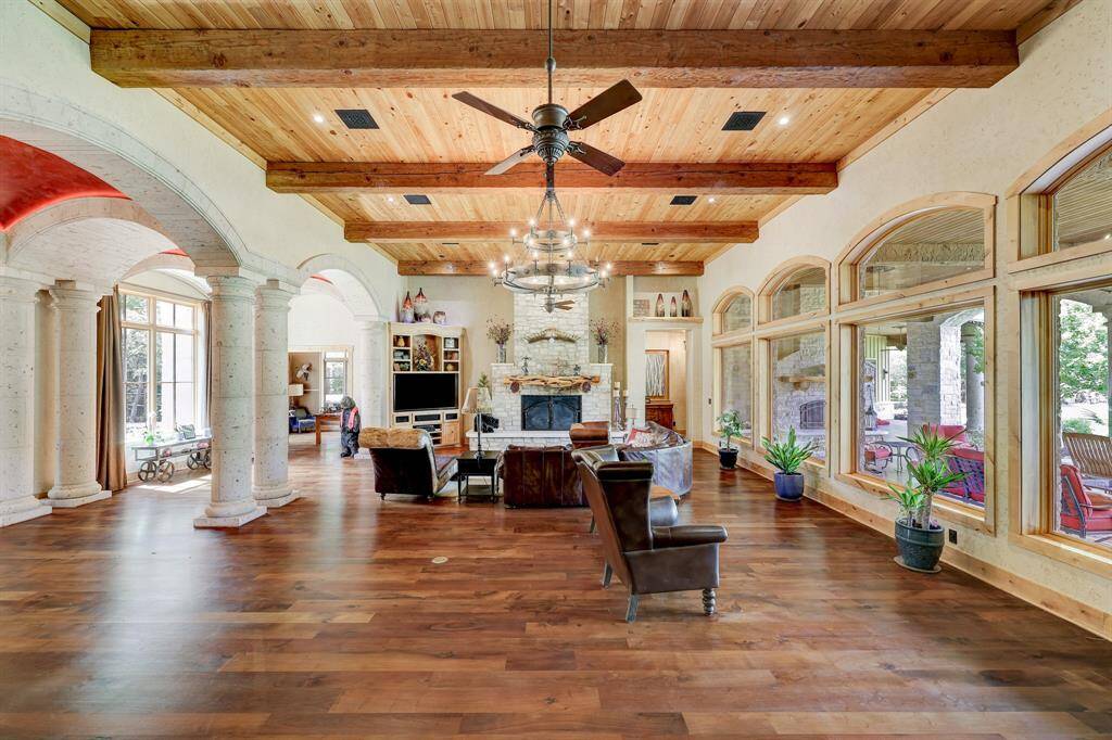 The beautiful open concept living room flows directly into the kitchen and foyer.