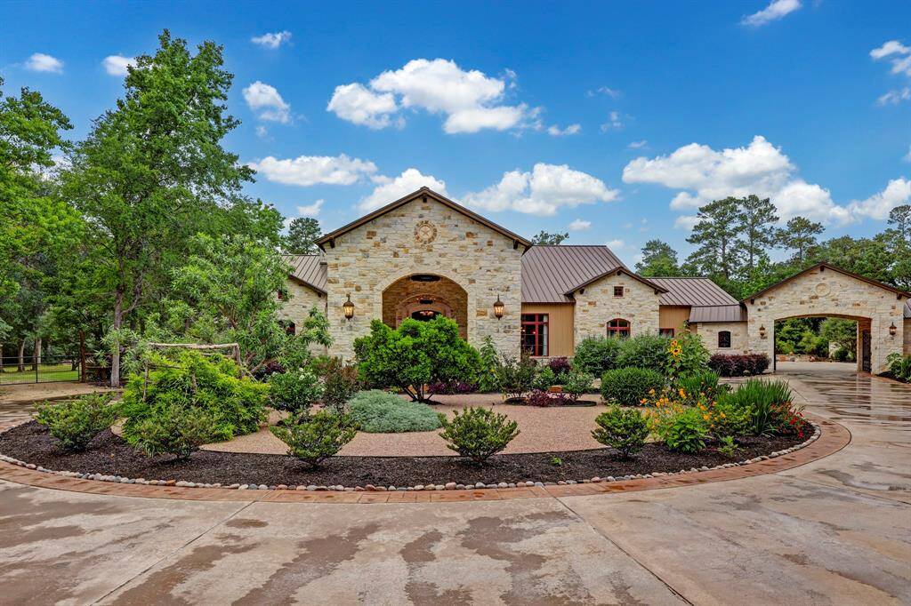 The oversized circle driveway provides ample parking.