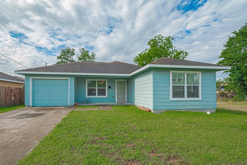 1002 E 37th St is a 3 bedroom 2 full bath on a quiet street in Independence Heights.