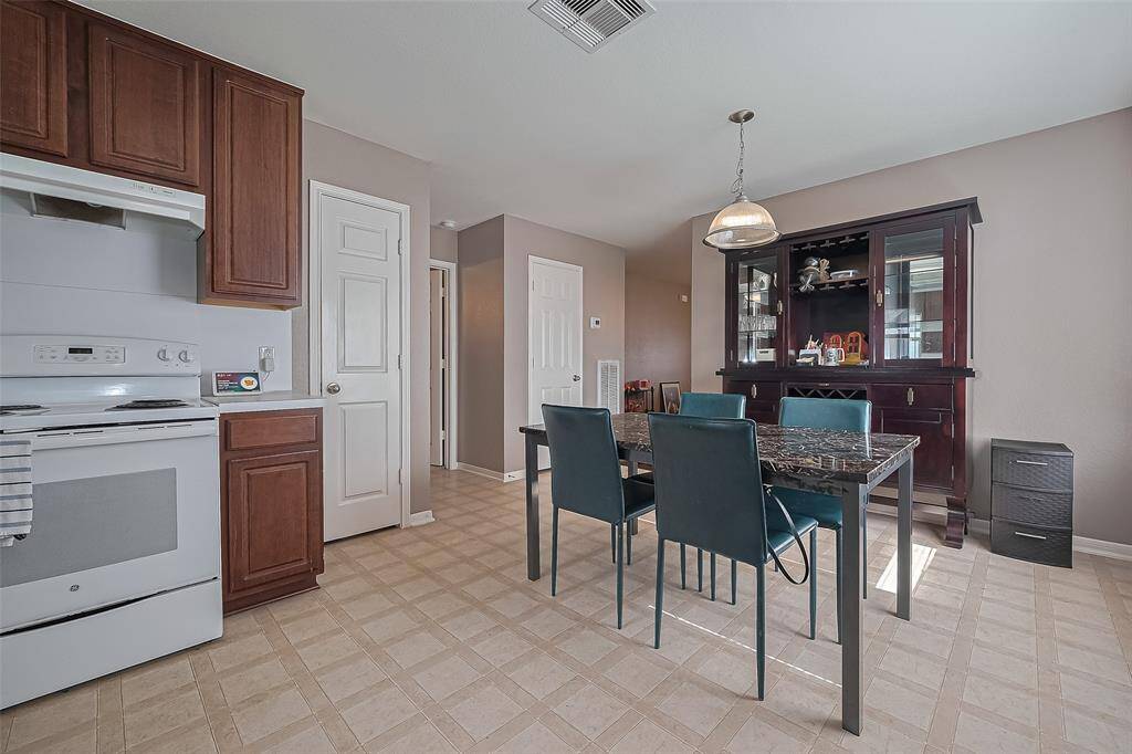 The 8x12 SF dining room has a great amount of space for entertaining!