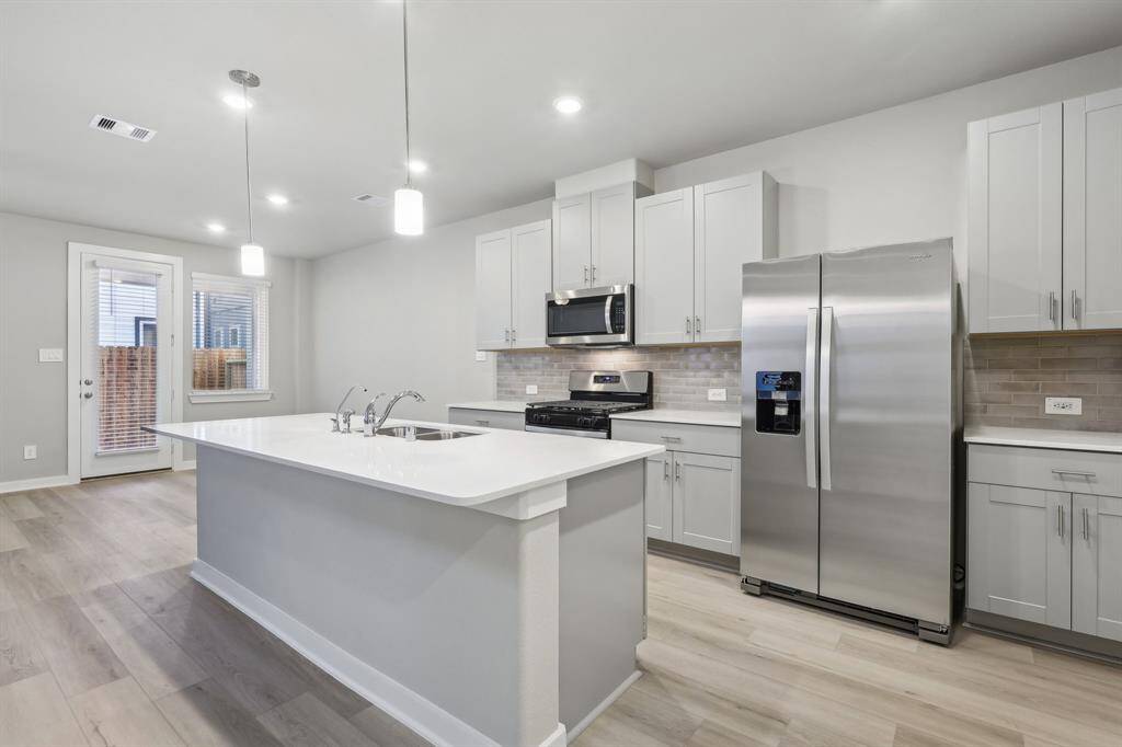 Photo is not of the actual home, but is an inspirational photo of builder’s model home and may depict options, furnishings, and/or decorator features that are not included