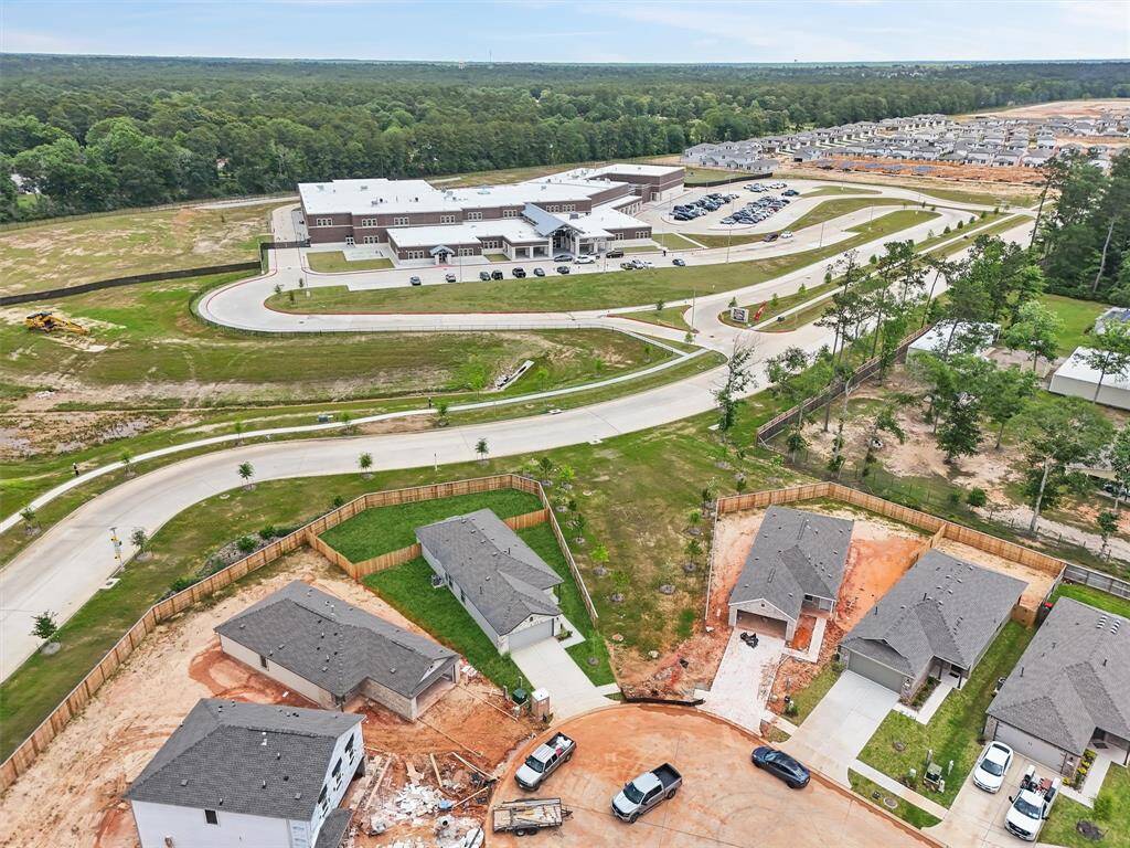 Enjoy peaceful views of the nearby retention pond, which also serves as a natural flood control feature—offering both beauty and peace of mind.