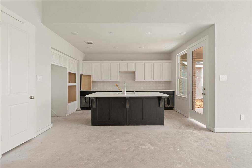 Seamlessly blending cooking and dining spaces for effortless entertaining