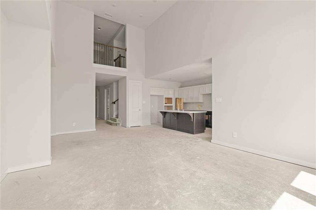 Bathed in natural light- this space feels as expansive as it is inviting