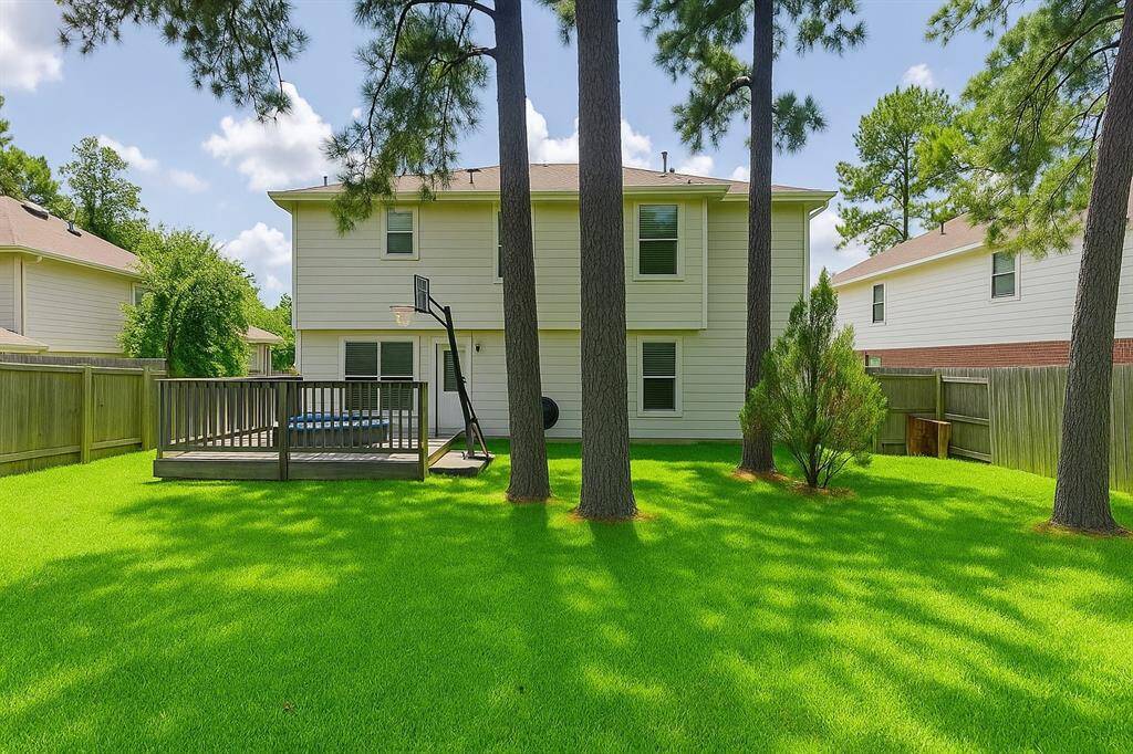 The home boasts a large backyard with plenty of space for outdoor activities, entertaining, or adding a pool or garden.