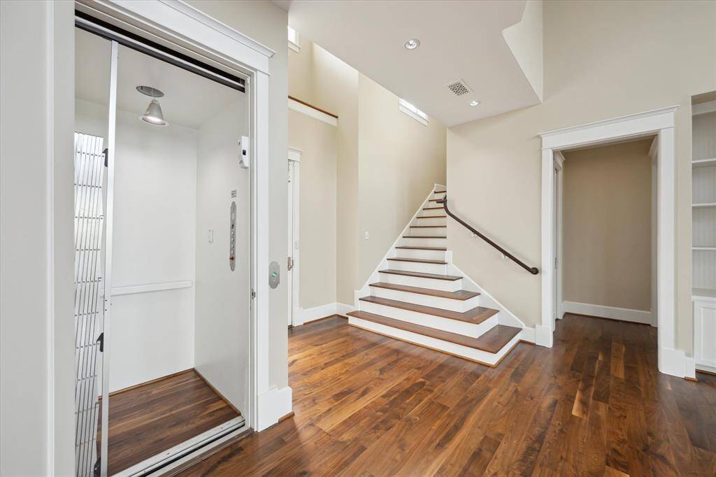 The home is equipped with a convenient elevator that provides easy access to all levels, offering both comfort and practicality. Whether for daily convenience or entertaining guests, this elevator ensures effortless movement between floors