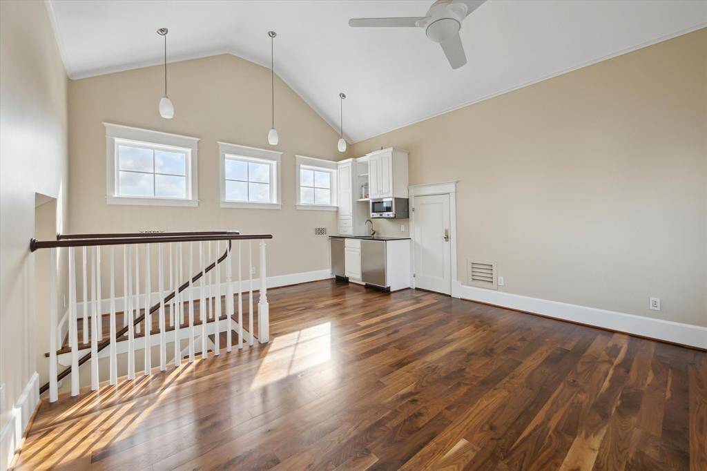 The top-level loft observatory, complete with a mini kitchen, is the perfect space to relax with a book while enjoying views of boaters and birds passing by