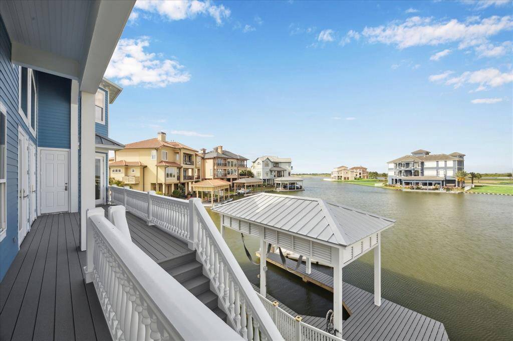 Second level terrace off of the main living quarters, kitchen, study & master suite. low maintenance outdoor finishes provide for easy living on the bay. Excellent waterfront views!