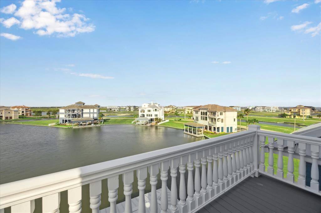 This view of the lagoon in your backyard stretches out to the Intracoastal Waterway and West Galveston Bay, offering a tranquil and picturesque setting