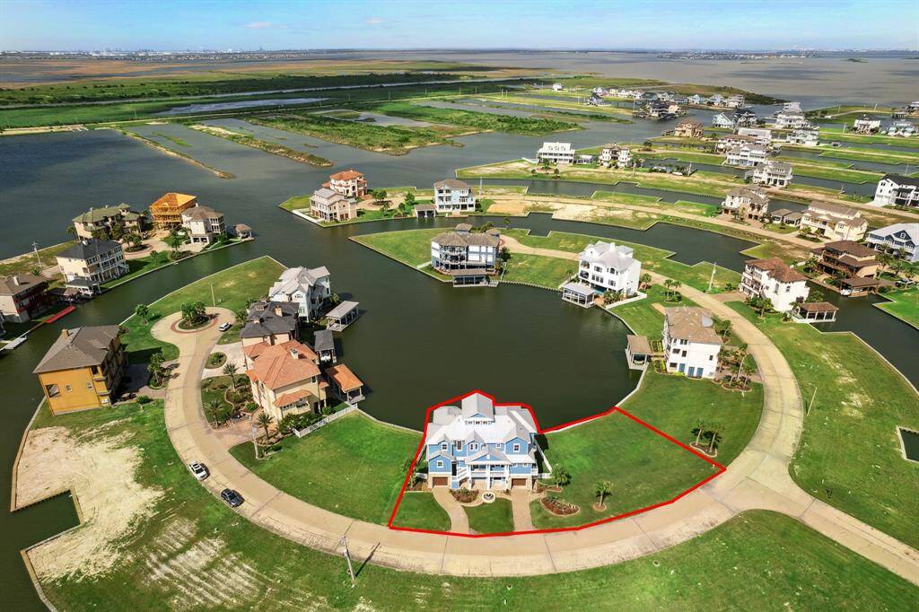 Positioned on a double homesite, this serene lagoon view in your backyard leads to the Intracoastal Waterway and West Galveston Bay—offering an idyllic and peaceful setting. Land outline is for illustration purposes and should be surveyed by buyer