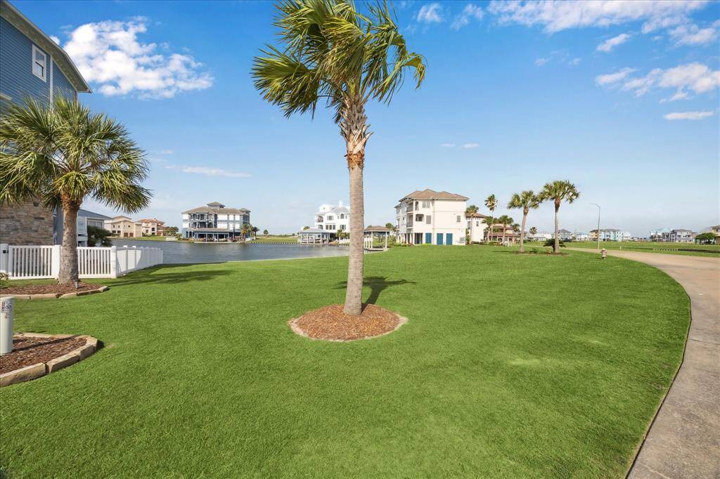 A beautifully appointed waterfront home offering more than just stunning views—it includes the rare advantage of an adjacent lot, providing endless potential