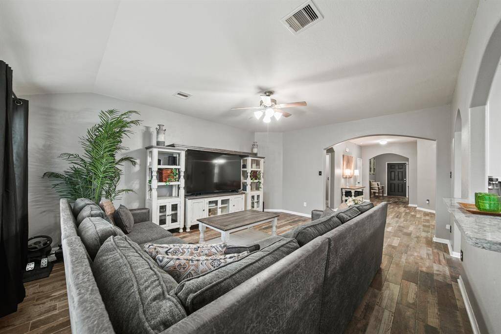 A view of the foyer from the back of the living room.