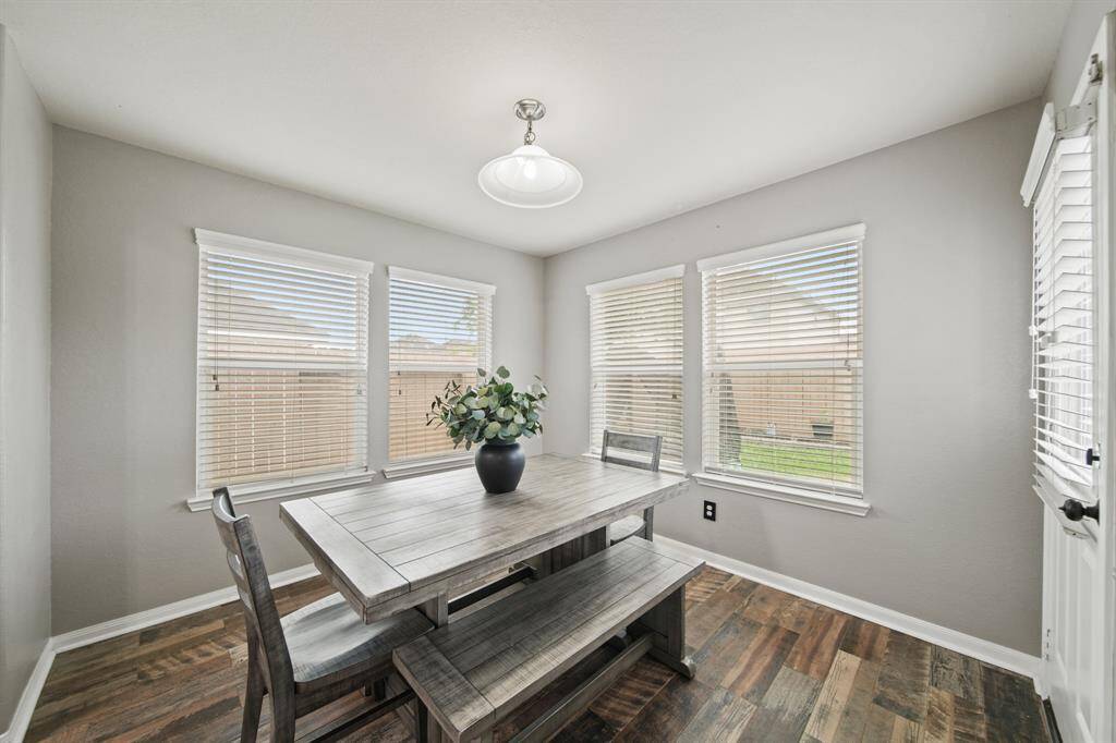 Ideal for casual dining, this breakfast room sits near the kitchen & living area.