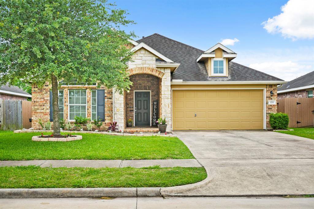 Welcome home to 1211 Quarterhorse Drive in Mustang Crossing!