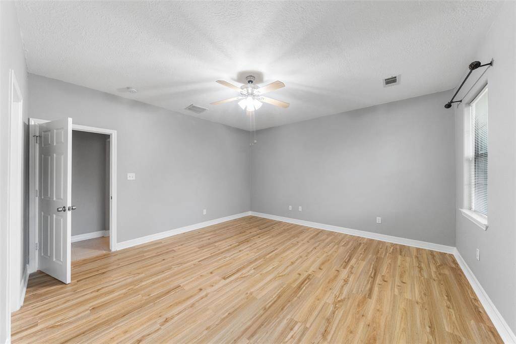 Primary Suite with brand new LVP flooring.