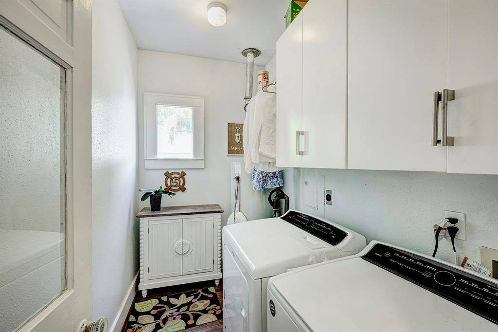 Downstairs laundry room is located just off the kitchen.