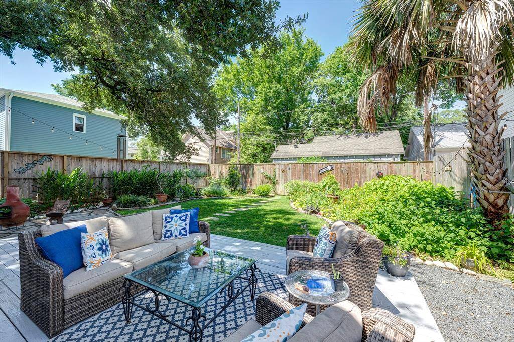 You will love sitting in the tree shaded backyard to look out over the butterfly garden.