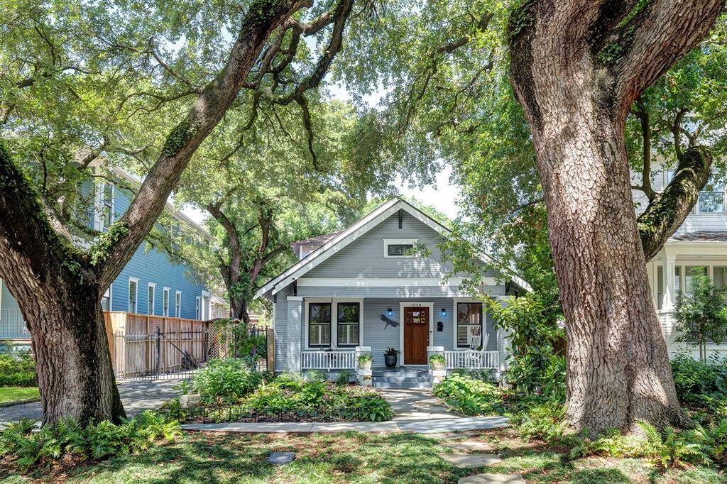 Spectacular 130+ year old live oak trees in front are protected by the City of Houston. The shade provided is wonderful to enjoy days out in the yard.