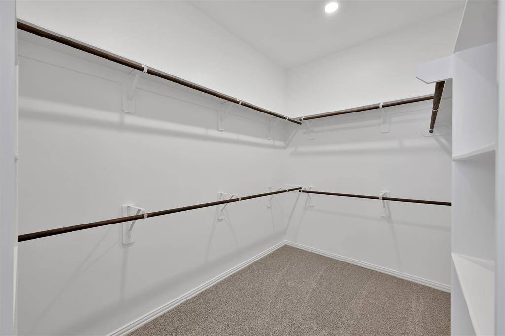 Primary walk in closet.