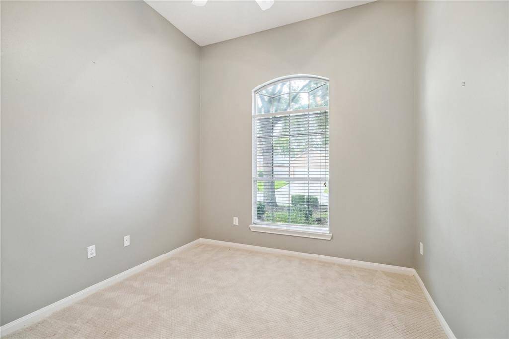 Secondary bath is just off the foyer next to Bedroom 2.