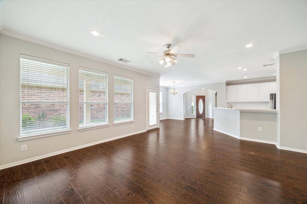 Office is immediately adjacent to the Den, and faces the side yard.