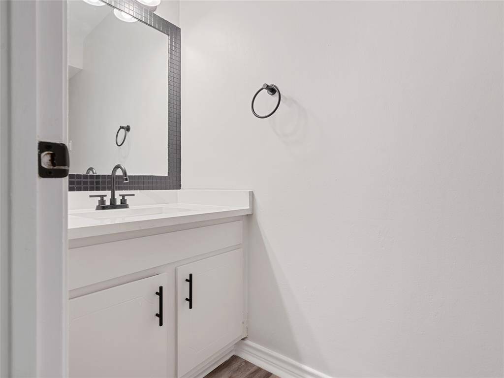 Half Bath featuring new counters and fixtures