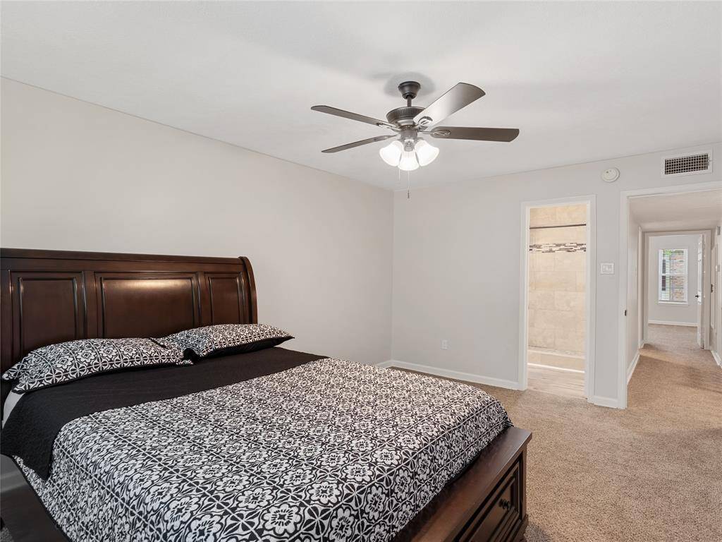 Another view of the primary bedroom