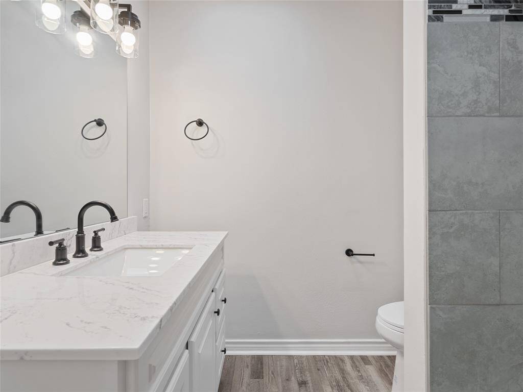 Primary bathroom with new windows and fixtures
