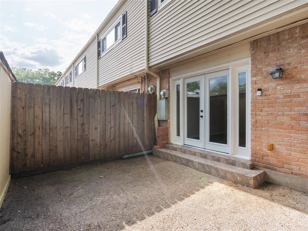 Back patio - ready for the new owner's personal touch!