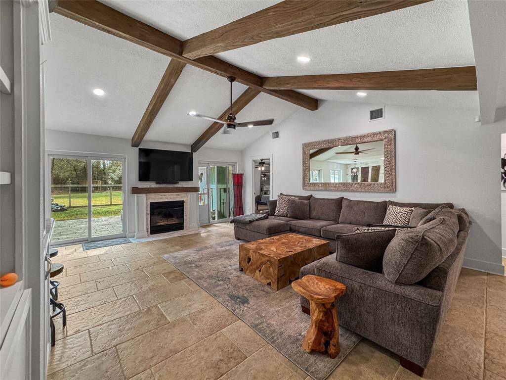 Main House Living Area with an Inviting Fire Place for Cozy Evenings