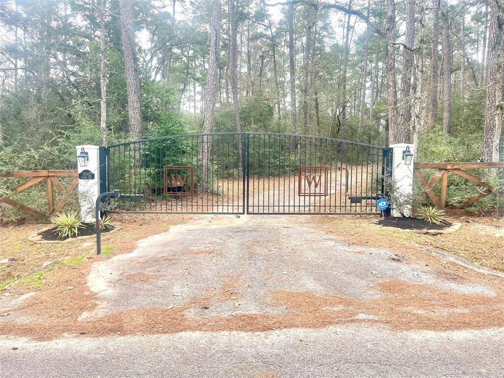Private Gated Entrance to 13537 Laramie Trail.