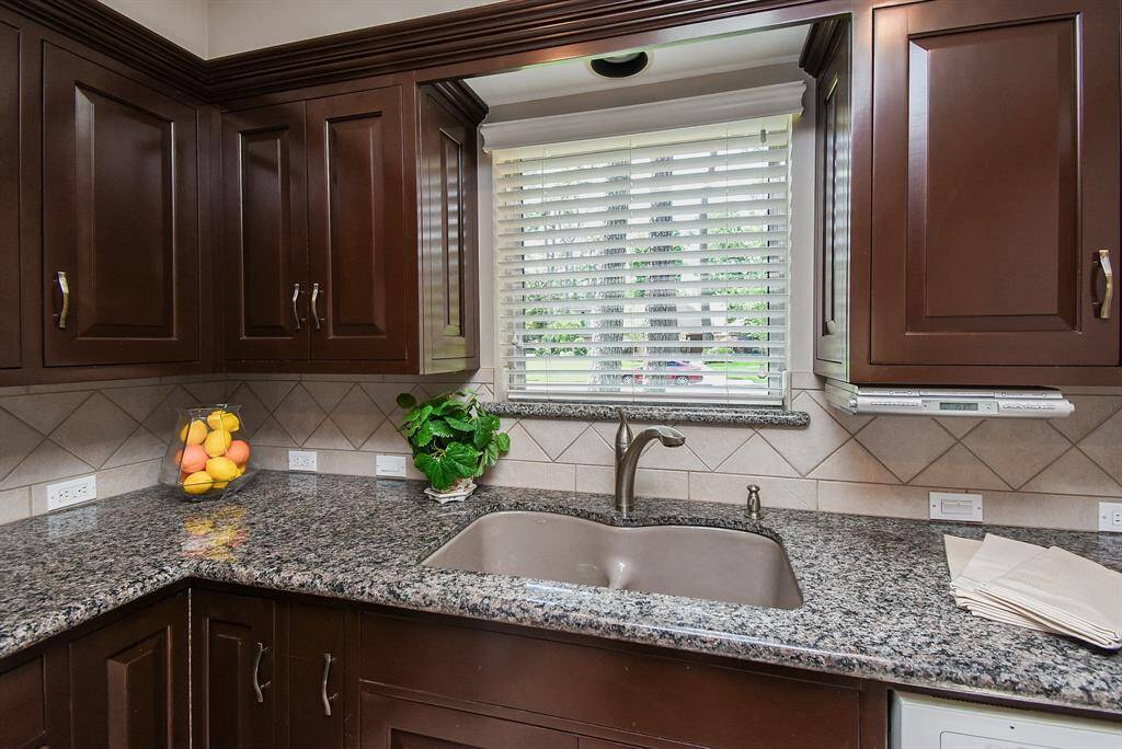 Who doesn't love a big window over the kitchen sink?