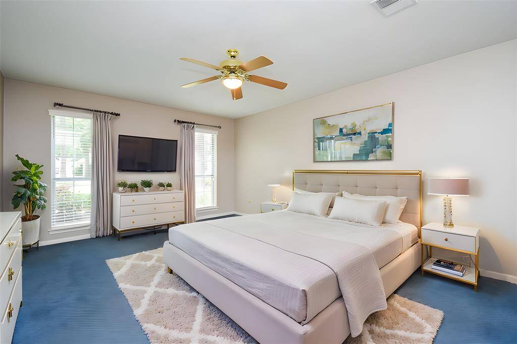This Virtually Staged Primary Bedroom gives you an accurate idea of the kind of generous wall/floor space you have in your private retreat!
